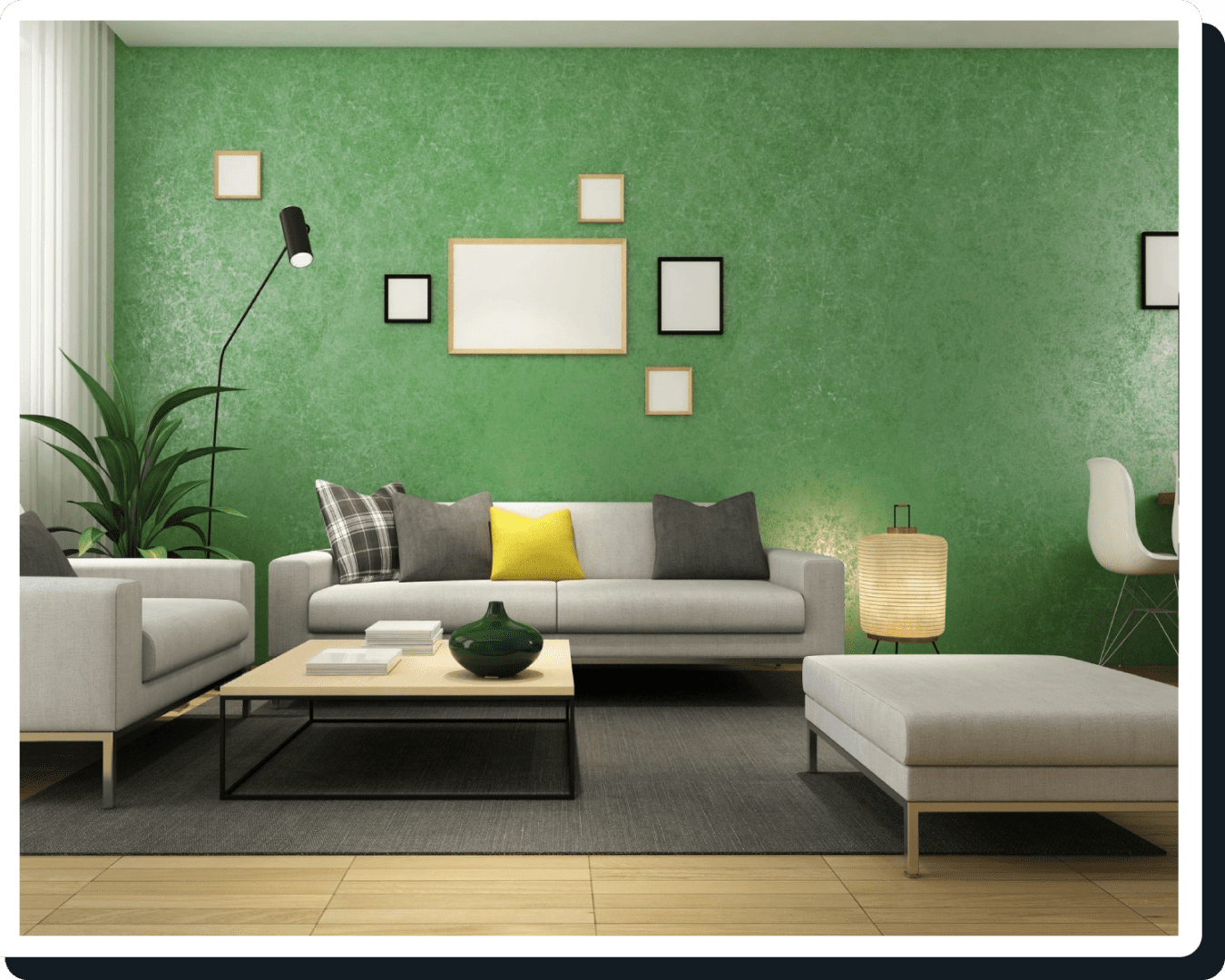 A living room with green walls and white furniture.