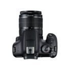 Canon EOS 2000D DSLR camera with 18-55mm zoom lens top view.