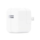 White compact USB-C wall power adapter with foldable plug on a light background.