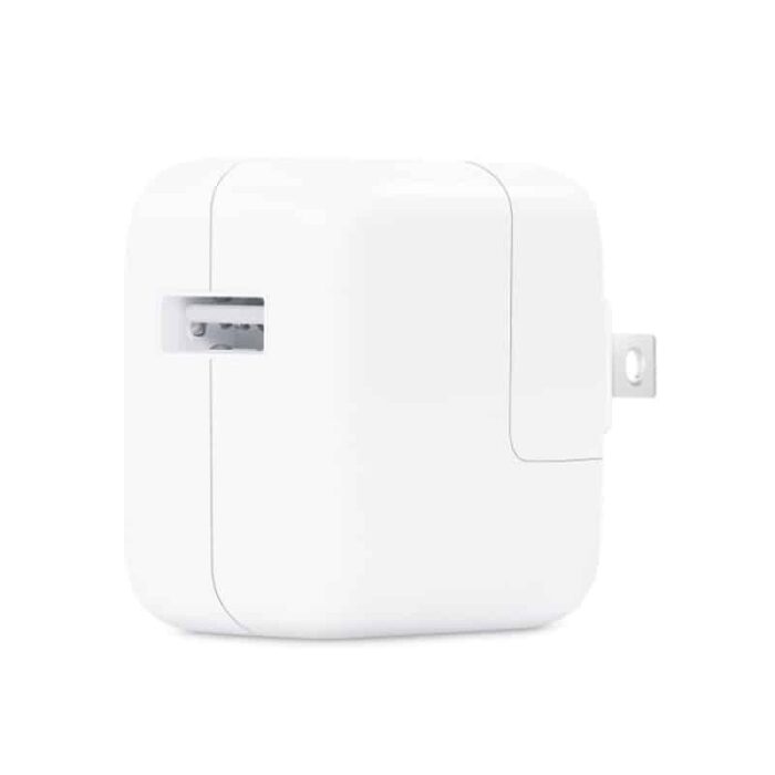 White compact USB-C wall power adapter with foldable plug on a light background.