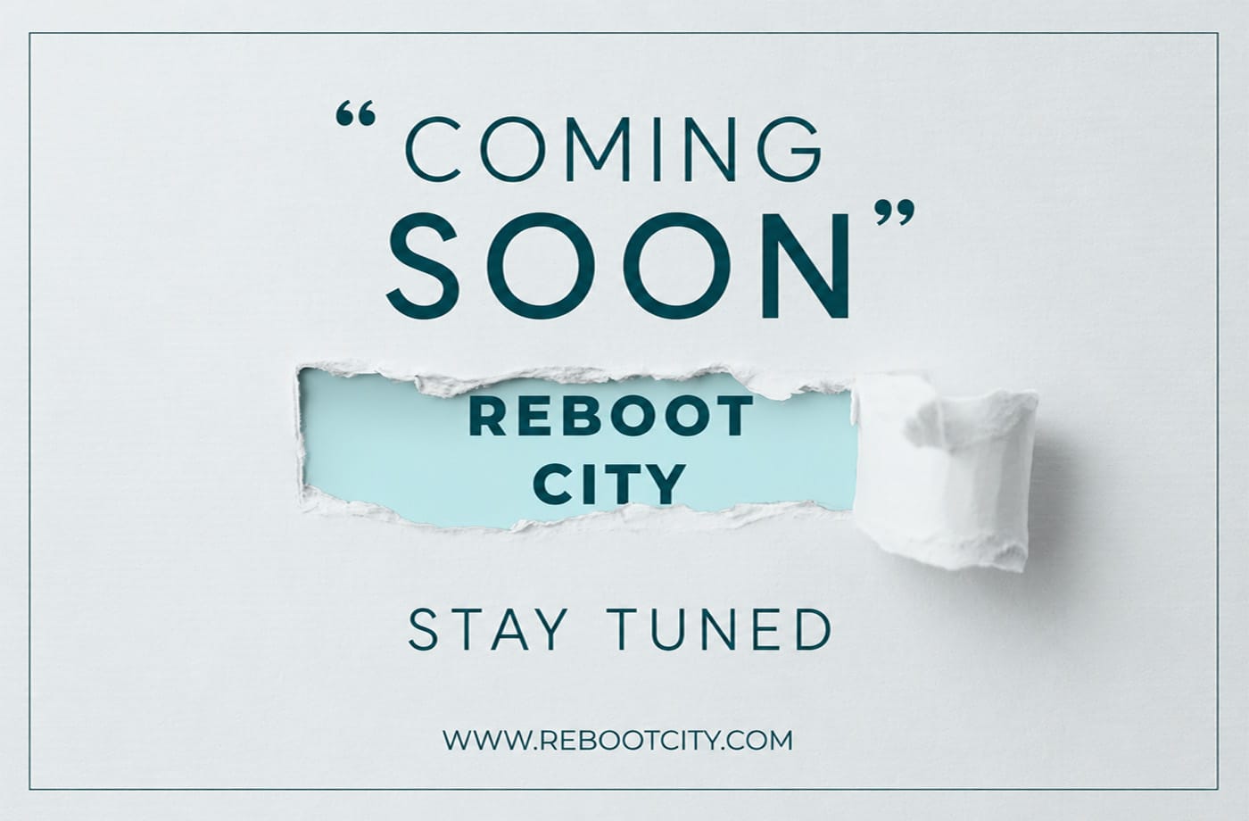 Reboot City coming soon announcement banner featuring a torn paper effect with "Reboot City" revealed, "Coming Soon" headline, and "Stay Tuned" message.